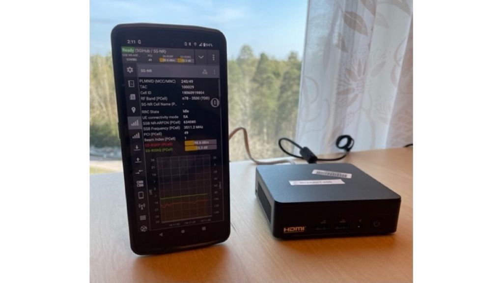 The portable setup of the INTERACT-B5G Project (Client: Crosscall device with Qualipoc; Server: ASUS NUC 12WSK). The portable setup of the INTERACT-B5G Project (Client: Crosscall device with Qualipoc; Server: ASUS NUC 12WSK).