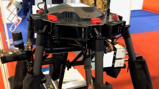 A drone equipped with two R&S®TSMA6 scanners and two QualiPoc Android smartphones