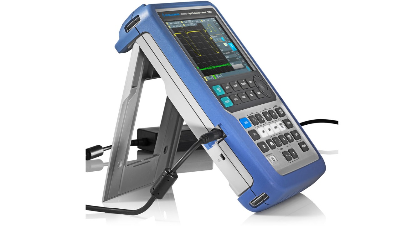 R&S®Scope Rider handheld oscilloscope with attached power supply